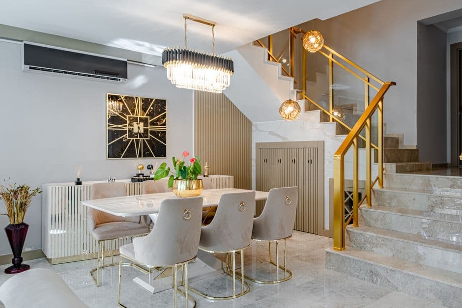A marble-topped dining table in a modern dining room