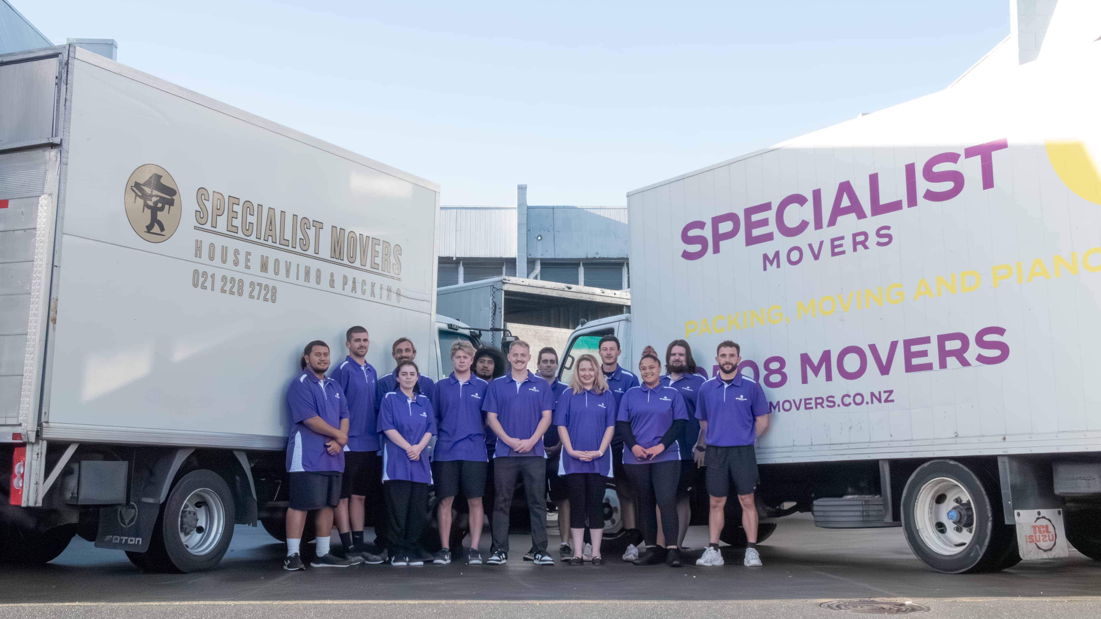 Specialist Movers team and trucks at the Wairau Valley depot