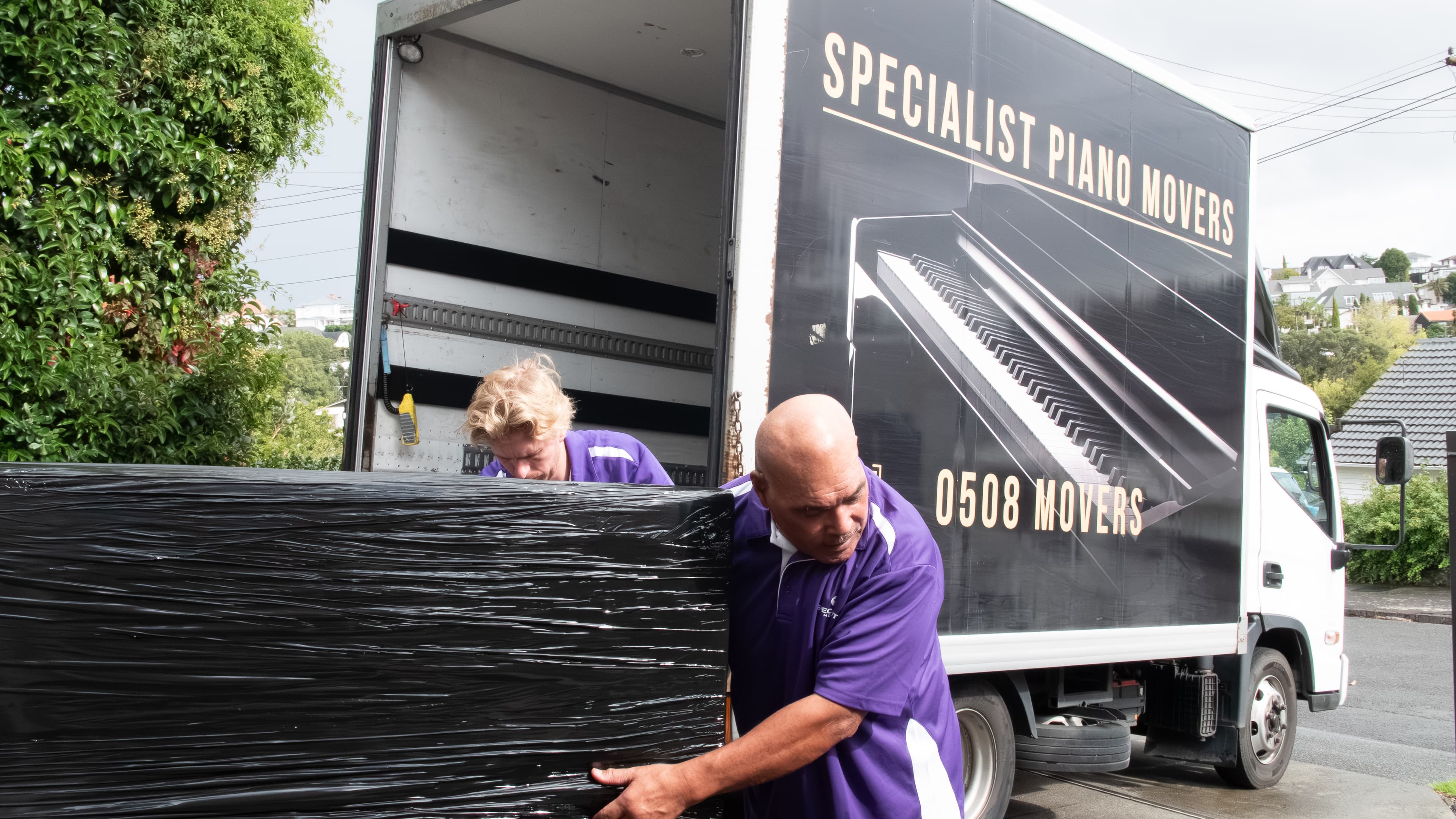 Specialist Movers truck loaded for a commercial job